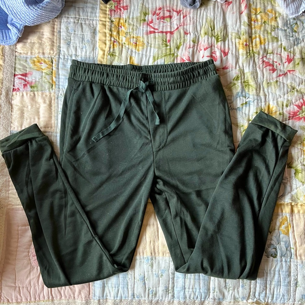 Dark green sweats. Five below. Size M